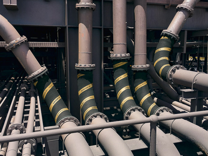 Flexible rubber Slurryflex hose installed in a processing plant