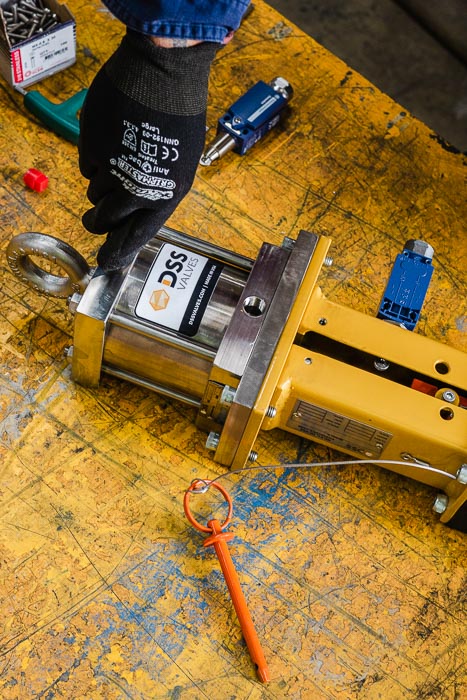 A technician assembling a DSS (model) knife gate valve in our Australian valve manufacturers workshop