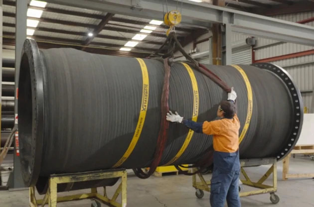 Large DN1500 Slurryflex mining hose being lifted in the Beaver workshop